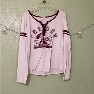 Long sleeve shirt with lace up cut out